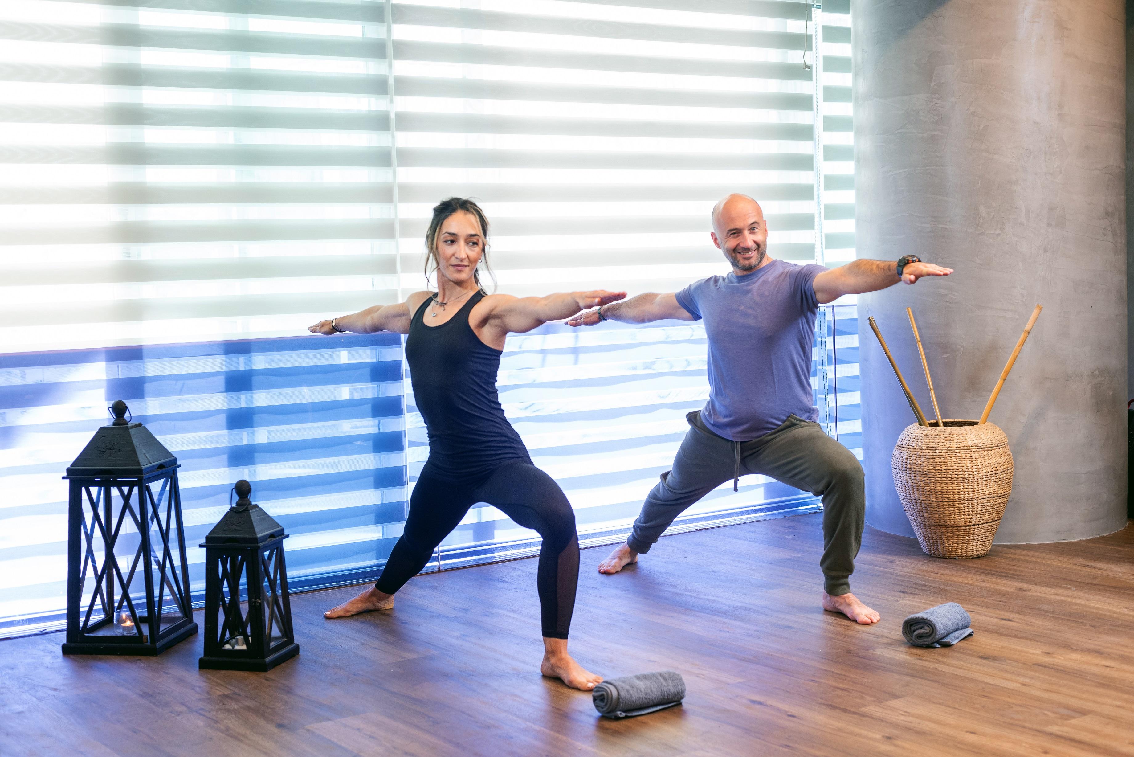 St George Lycabettus Lifestyle Hotel Athens Exterior photo A couple practicing yoga